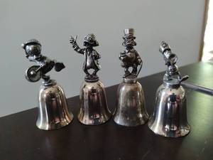 lot 37 image: Four NE Disney Ducks Bells