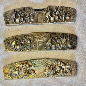 lot 73 image: Vintage Silver Tone Repousse Combs and Holders