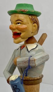 lot 126 image: Vintage and Fun Articulated Bottle Stopper