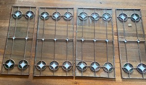lot 135 image: Set of Four Corresponding Leaded Glass Windows