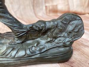 lot 287 image: Metal Boy With His Dogs Statue