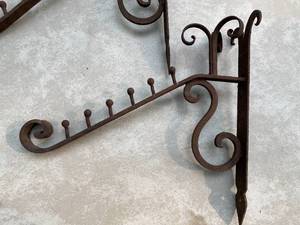 lot 400 image: Wall Mount Hangers Rusty Hangers