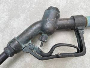 lot 420 image: Vintage U-17 Gas Pump Nozzle On A Pole