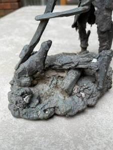 lot 427 image: Man and Dog Statue