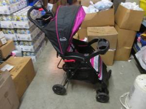 lot 213 image: (RMT) Folding Stroller...