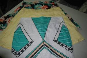 8 Womens skirts size Large...