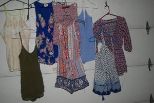 8 rompers size Large...