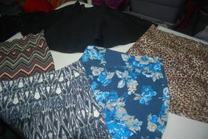 8 skirts and a romper size Medium...