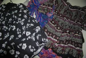 4 rompers size XS...