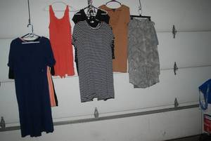 11 dresses and a skirt size XL...