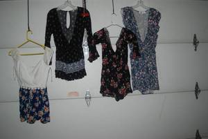 4 rompers size Small...