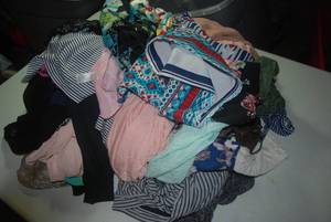 32 tops, a romper, a skirt and a bo...