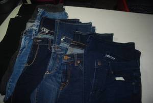 7 pair jeans size 4...