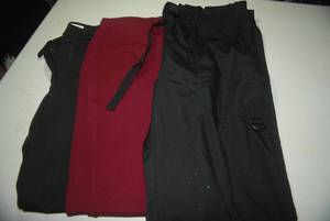 8 pair of pants all seem to be Medi...