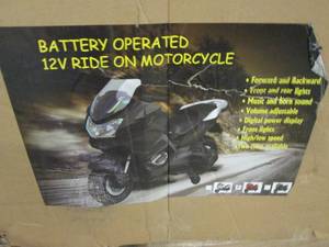 lot 14 image: battery ride on 12v motorcycle ...