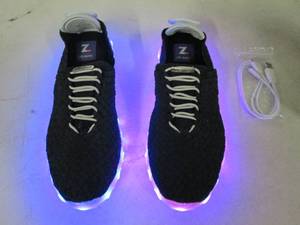lot 153 image: Zee Alexis Light up chargable shoes...