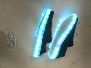 lot 155 image: Zee Alexis Light up chargable shoes...