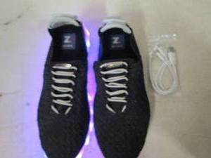 lot 156 image: Zee Alexis Light up chargable shoes...