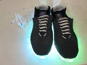 lot 157 image: Zee Alexis Light up chargable shoes...