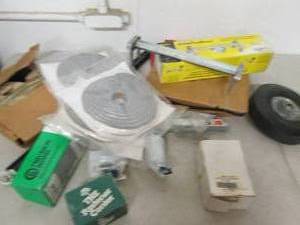 lot 176 image: box of fan braces, bolts , pully an...