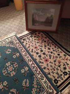 lot 35 image: Two Rugs and One Framed Picture