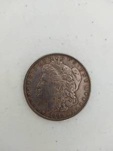 lot 113 image: 1886 Morgan Silver Dollar