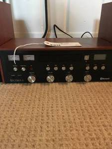 lot 41 image: Victrola Bluetooth CD Stereo with 15 CDs