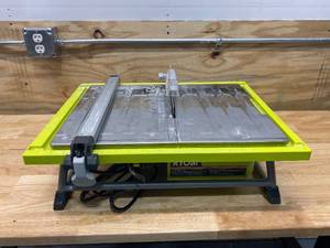 lot 96 image: RYOBI 7 in. 4.8 Amp Tile Saw with Stand