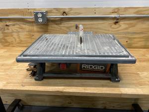 lot 120 image: RIDGID 6.5 Amp Corded 7 in. Table Top Wet Tile Saw