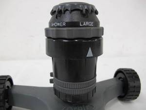 lot 554 image: Orbit 6-Function Sprinkler on Wheels