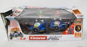 lot 599 image: MarioKart Carrera GT Radio Controlled Car Bundle
