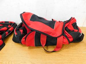 lot 33 image: 2 Heavy duty Duffle Bags with pull handle and wheels.