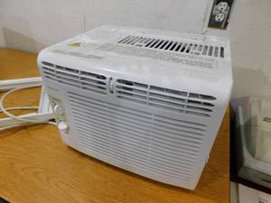 lot 47 image: 5,000 BTU 115-Volt Window-Mounted Mini-Compact Air Conditioner with Mechanical Controls