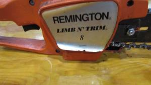 lot 21 image: Electric Remington Chain Saw
