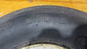 lot 48 image: Spare Tire and 5 Bolt Rim