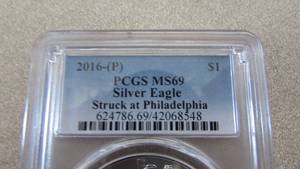 lot 100 image: Silver Eagle Dollar Coin