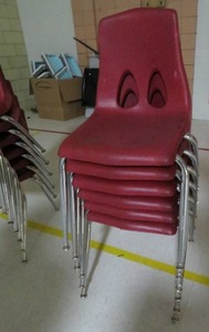 lot 15 image: RED SCHOOL CHAIRS