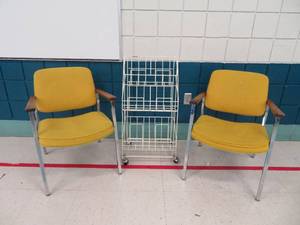 lot 82 image: 2 yellow chairs and metal rolling magazine cart