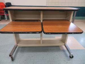 lot 85 image: Heavy duty rolling computer desk.