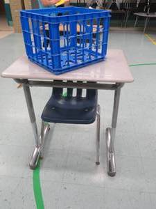 lot 93 image: Adjustable school desk with blue chair and crate