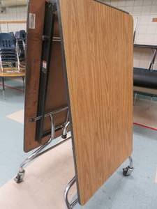 lot 99 image: Foldable table on castors.
