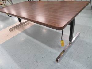 lot 103 image: Wooden and metal work table with electric hookup
