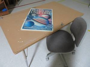 lot 130 image: table, chair, and school science book