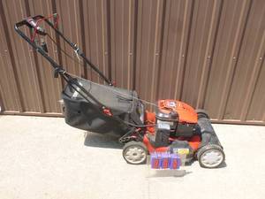 Troy Bilt electric start lawn mower. May need battery. Mower runs & works as it should. As shown.