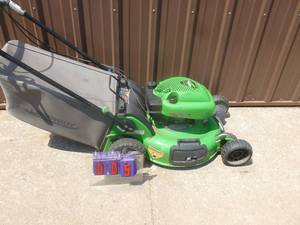 Lawn Boy 4 cycle lawn mower with bagger. Good running. Tested & works. As shown.