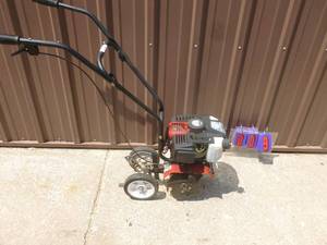 Earthquake 2 cycle mini tiller. Tested & works. As shown.