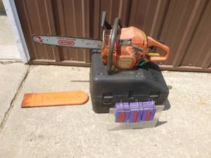 Husquevarna model 142 chain saw with case. Tested & works. As shown.
