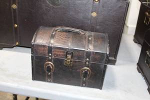 lot 990 image: Leather Trunk