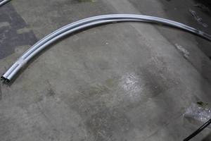 lot 875 image: Lot of (4) Curved Pipe and Drape Poles