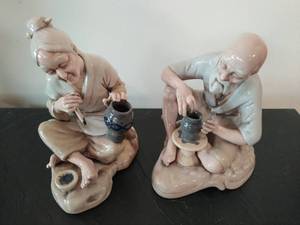 Two Mud Men Figurines